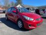 2014 Red Hyundai Accent GLS 4-Door (KMHCT4AE5E4) with an 1.6L L4 DOHC 16V engine, located at 101 N. Main Street, Muncy, PA, 17756, (570) 546-5462, 41.207691, -76.785942 - Photo#1